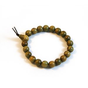 Wrist mala bracelet with Verawood beads.