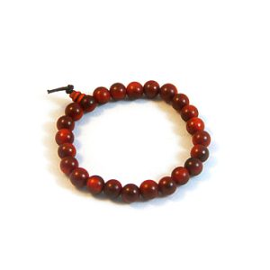 Wrist mala bracelet with Dragon Blood Wood beads.