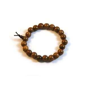 Wrist mala bracelet with Phoenix Tail Wood beads.