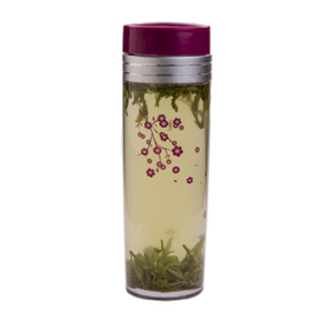 Clear tea traveler with plum blossom pattern on the front and magenta lid.