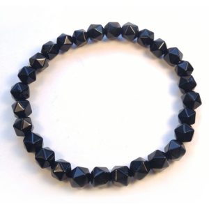 A wrist mala bracelet with black tourmaline multifaceted beads.