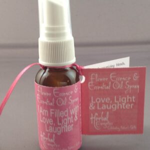 Small spray bottle of Flower Essence & Essential Oil Spray, Love, Light, Laughter Scent.