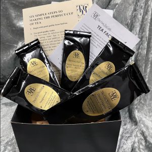 Black gift box with five 1-oz packages of tea and tea facts.